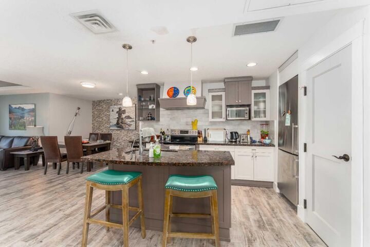 Property Photo: 173 Kananaskis Way 213 AB T1W 0A2
