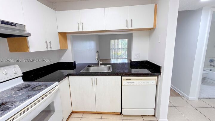 Property Photo: 753 NW 103rd Ter 202 FL 33026