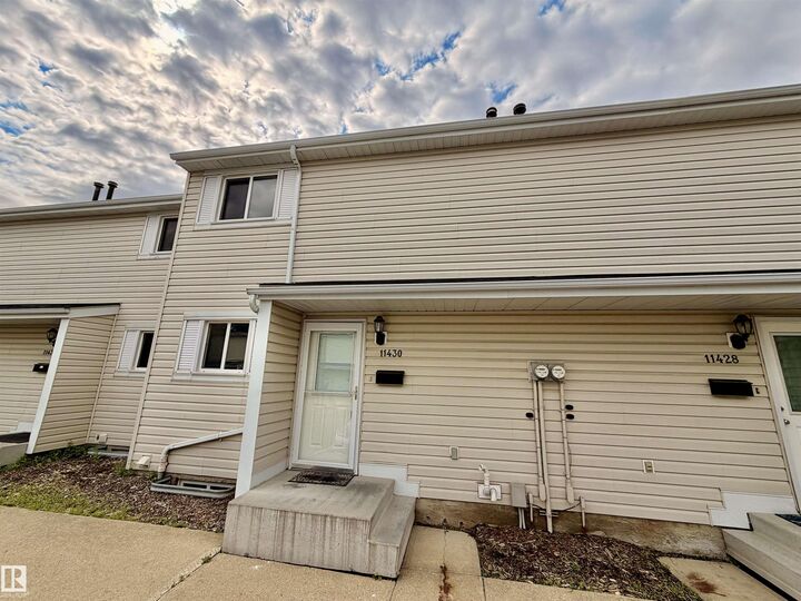 Property Photo:  11430 139 Avenue NW  AB T5X 3L4 