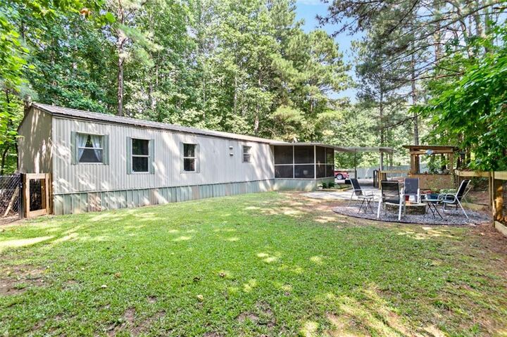 Property Photo:  5002 Bee Tree Road SE  GA 30102 