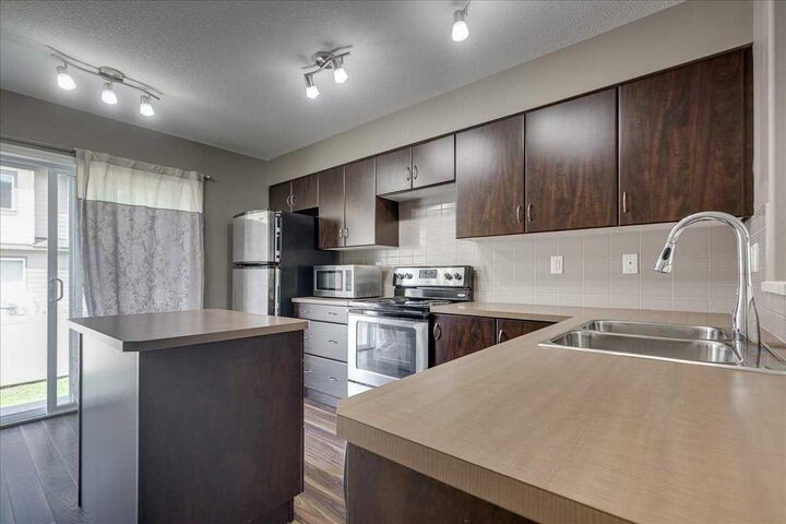 Property Photo: 30 Carleton Avenue 406 AB T4P 0M8