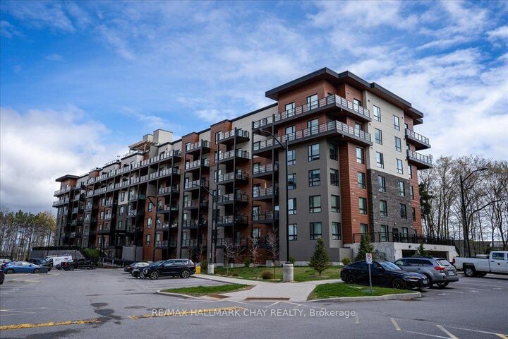 302 Essa Road 203 — photo 1