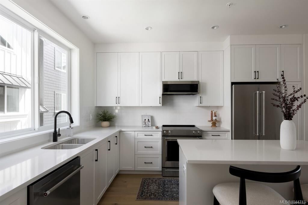 Property Photo:  10145 Fifth St #7  BC V8L 0E4 