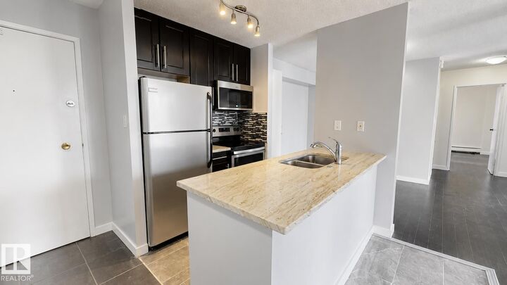 Property Photo:  10160 116 Street NW 1305  AB T5K 1V9 