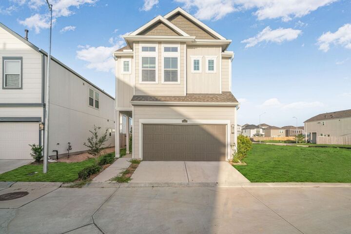 Property Photo: 11407 W Blossom Square Street TX 77047