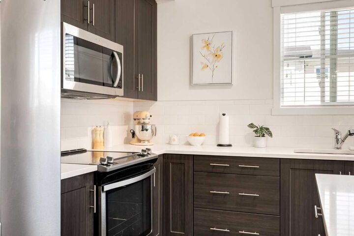 Property Photo:  151 Legacy Main Street SE 7310  AB T2X 4A4 