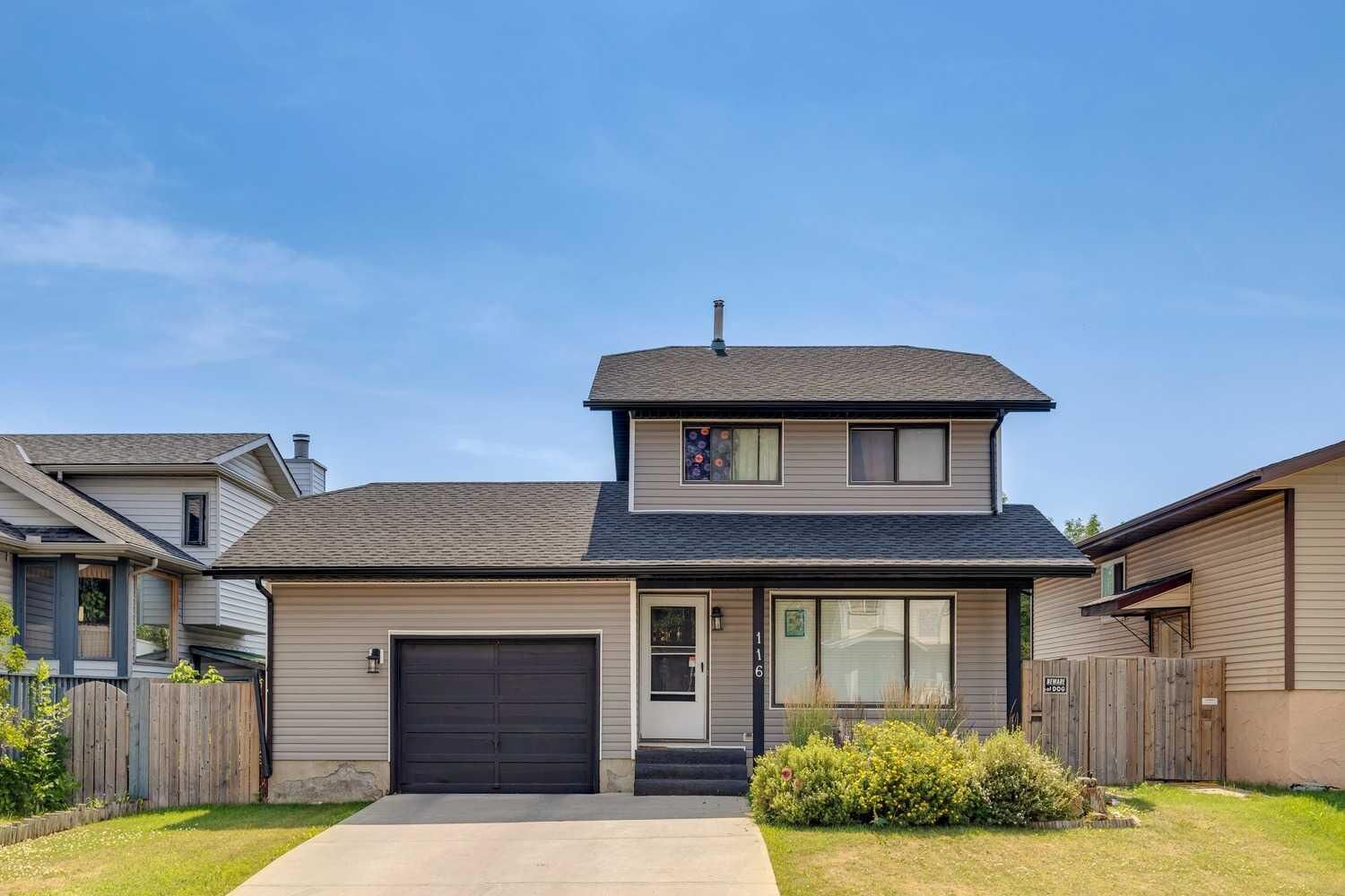 Property Photo:  116 Riverbirch Crescent SE  AB T2C 3L9 