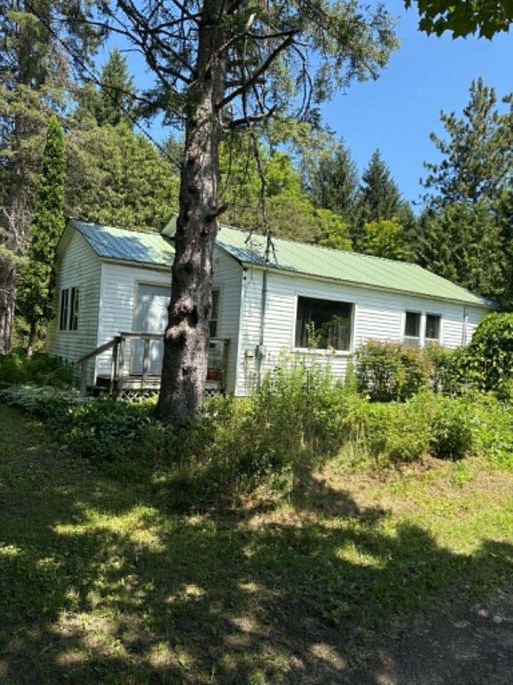 Property Photo:  7297 M-33  MI 49765 