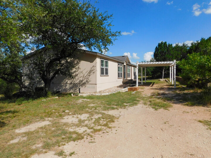 Property Photo: 7500 Muleshoe Bend Trail TX 78654