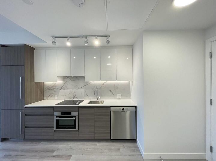 Property Photo:  10626 City Parkway 11xx  BC V3T 0S3 