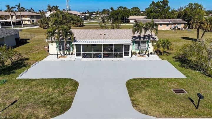 Property Photo:  311 Tudor Dr 1-2  FL 33904 