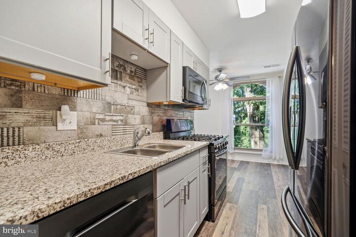 Property Photo:  3326 Woodburn Village Drive 23  VA 22003 