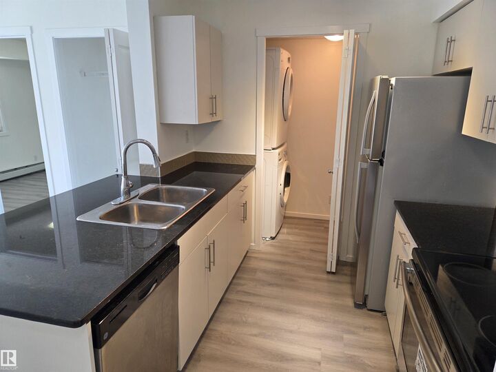 Property Photo: 5816 Mullen Place NW 309 AB T6R 0W3