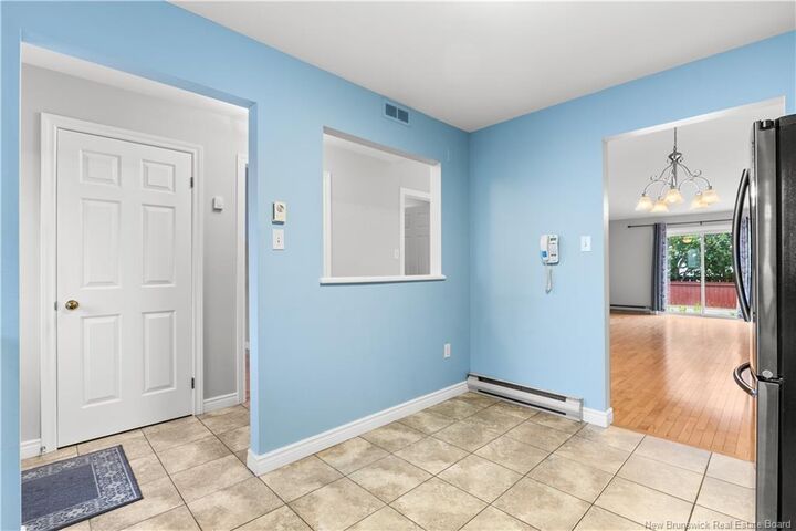 Property Photo:  208 Virginia 116  NB E1A 6R7 