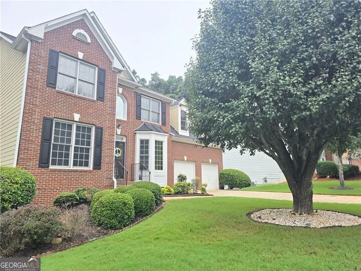 Property Photo: 6860 Deer Creek Trace GA 30087