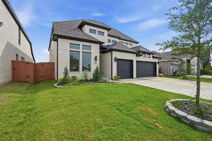 Property Photo: 24719 Hibiscus Garden Way TX 77493