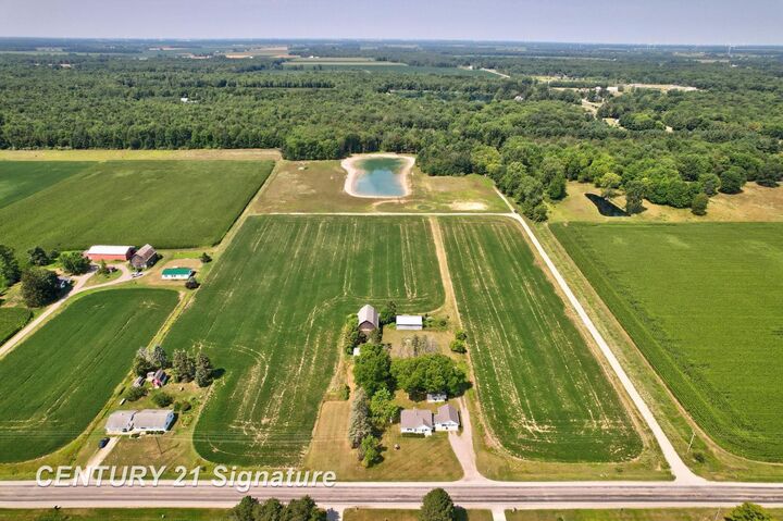 Property Photo:  2250 S Hemlock Road  MI 48626 