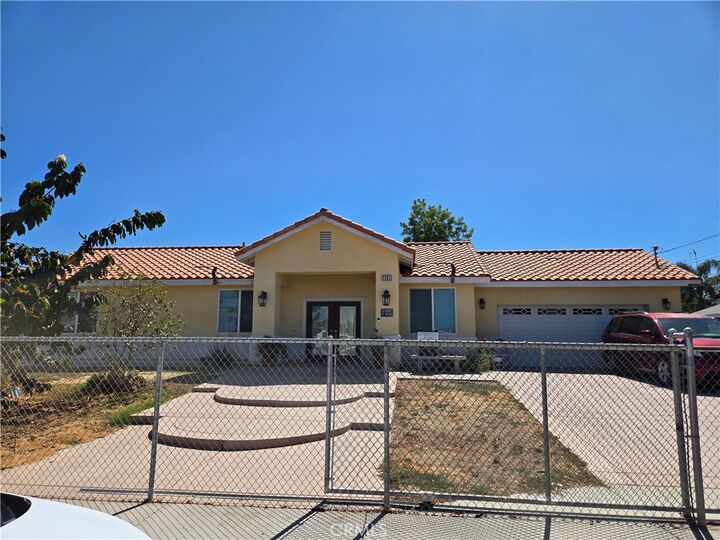 Property Photo:  7961 Pedley  CA 92410 