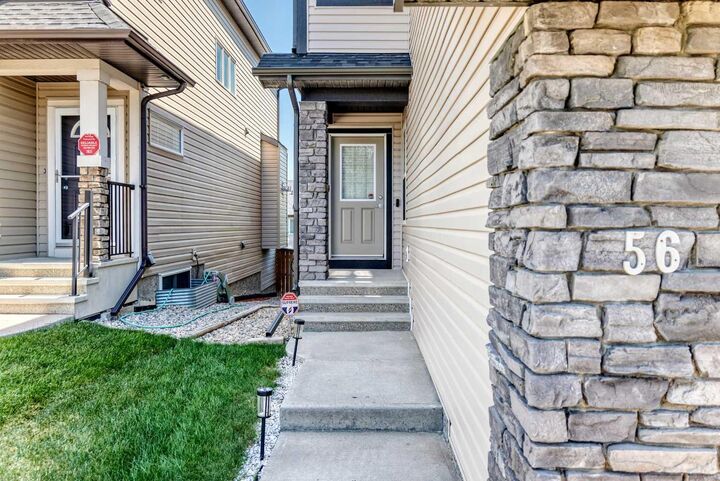 Property Photo: 56 Panatella Parade NW AB T3K 0V6