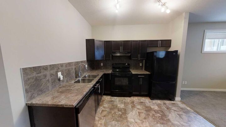 Property Photo:  8713 88 Street A  AB T8X 0G6 