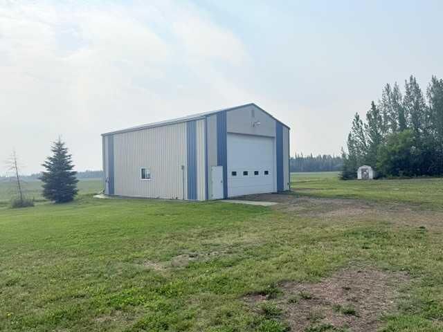 Property Photo: 861023 RR 214 AB T8S 1S5