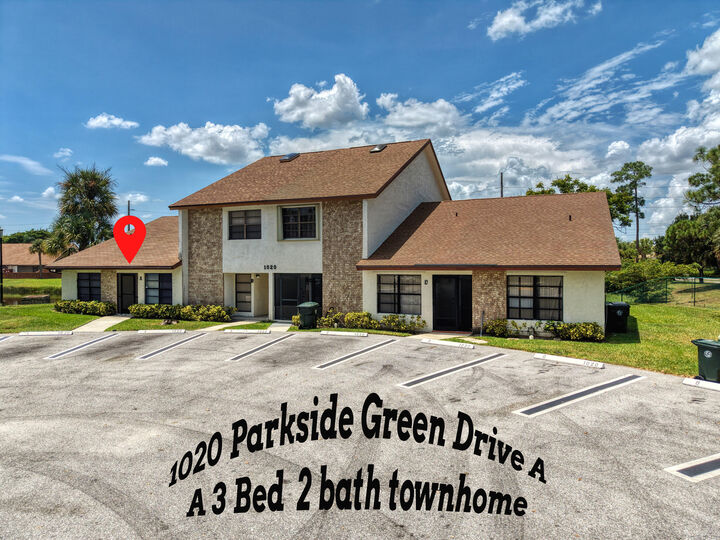 Property Photo: 1020 Parkside Green Drive A FL 33415