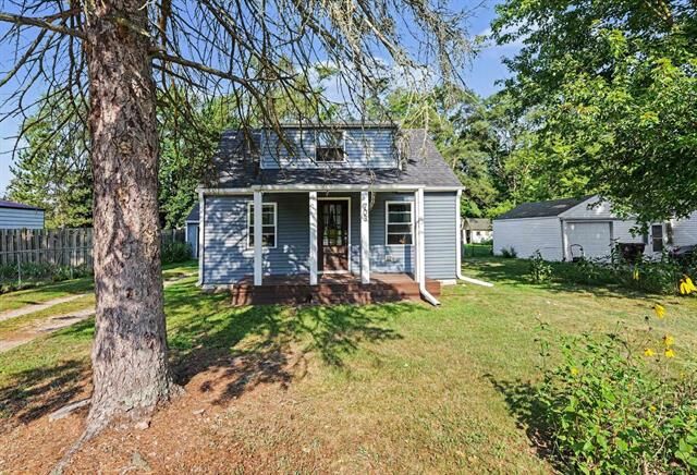 Property Photo: 703 N Henry Street MI 48858