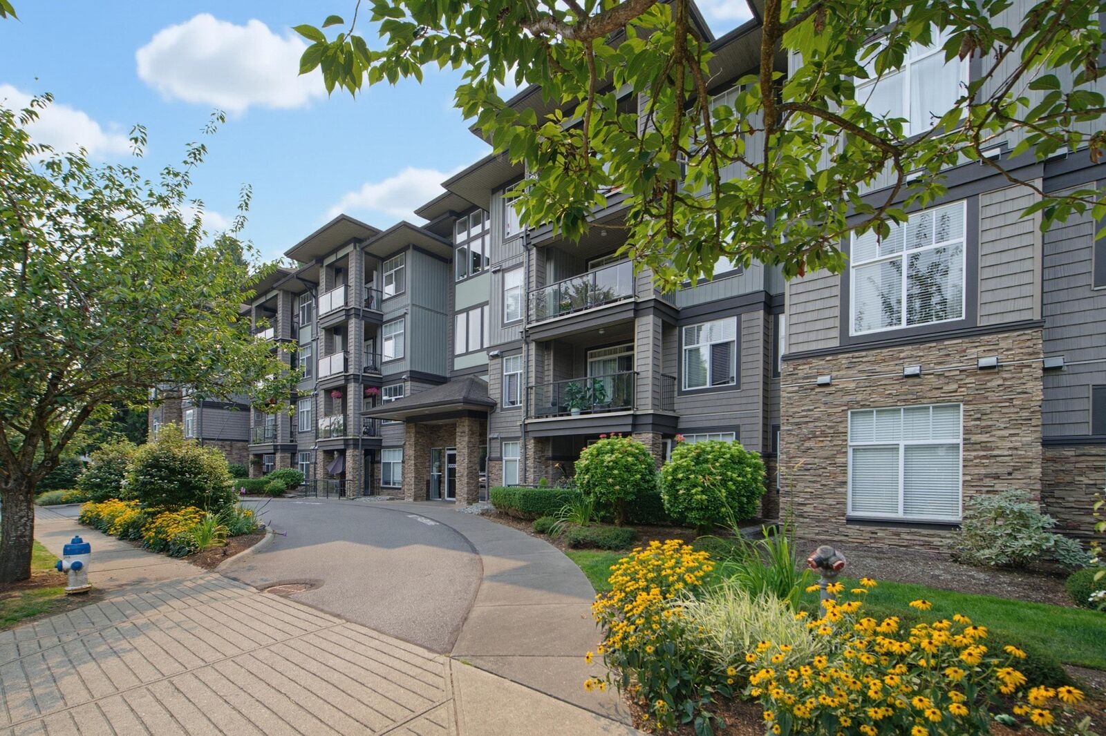 Property Photo:  33338 Mayfair Avenue 102  BC V2S 0A4 