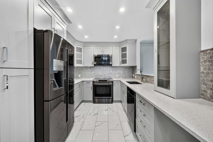 Property Photo: 13680 84 Avenue 404 BC V3W 0T6