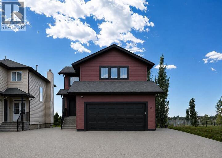 Property Photo: 57 Blue Heron Bay AB T1R 0X5