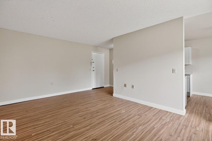 Property Photo:  11265 31 Avenue NW 5  AB T6J 3V7 