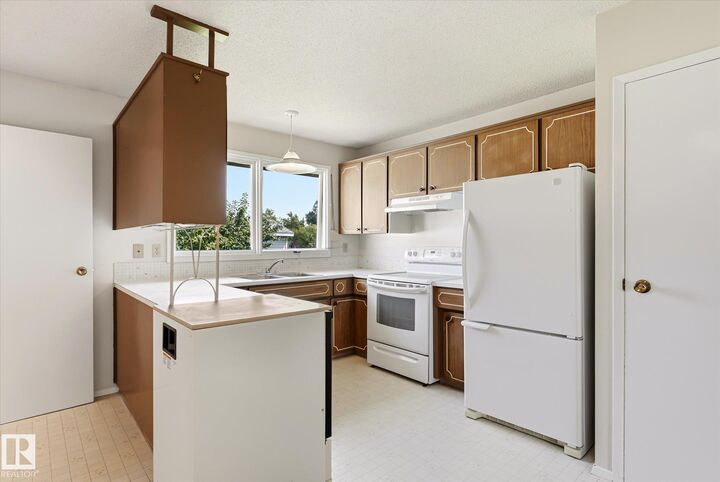 Property Photo: 14243 83 Street NW AB T5E 2X8