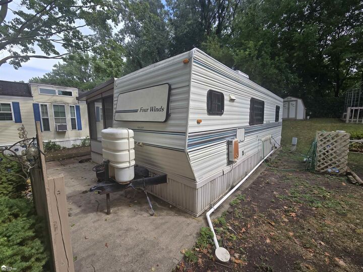Property Photo:  10001 E Goodall Road 24  MI 48429 