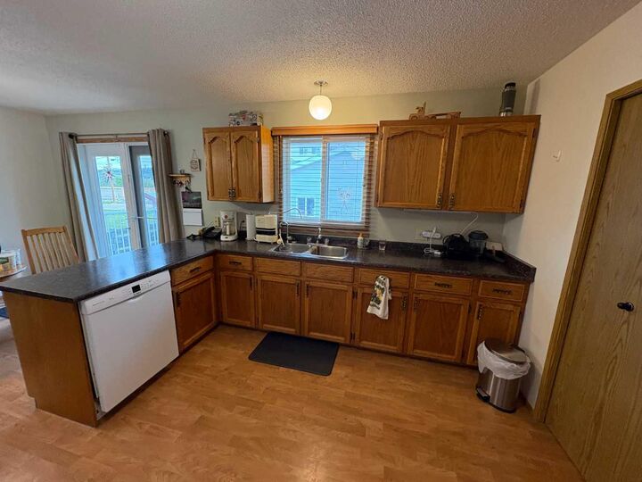 Property Photo: 10313 89 Street AB T8S 1N9