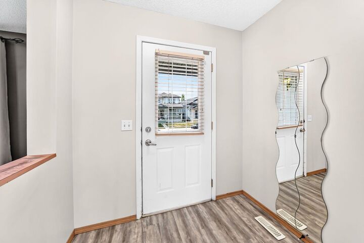 Property Photo: 15 Coventry Link NE AB T3K 5H6
