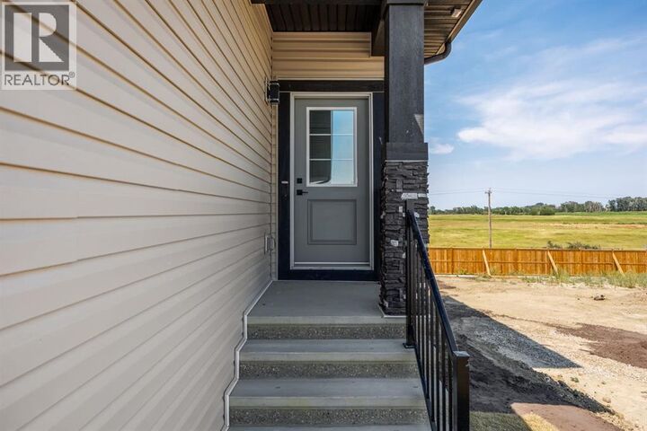 Property Photo: 140 Lakewood Crescent AB T1P 0G6