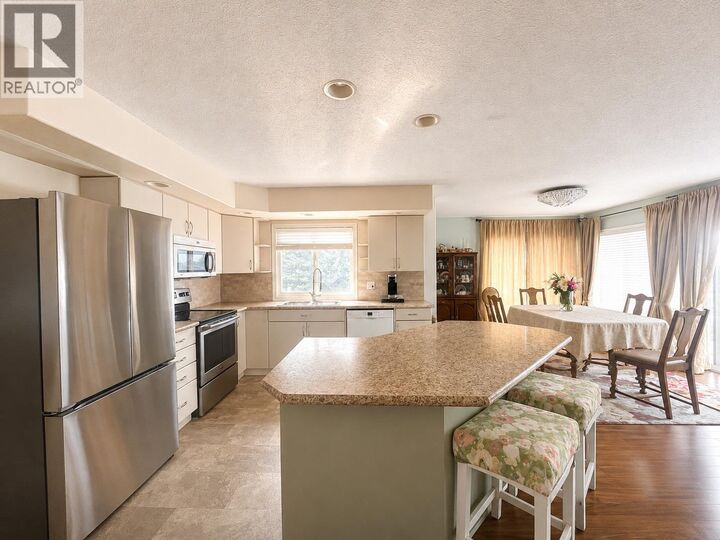 Property Photo: 2630 Nechako Drive 16 BC V2E 2C9