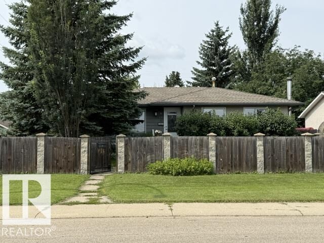 Property Photo: 13508 64 Street NW AB T5A 0Y9