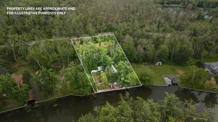 Property Photo: 8448 Devils Elbow MI 49716