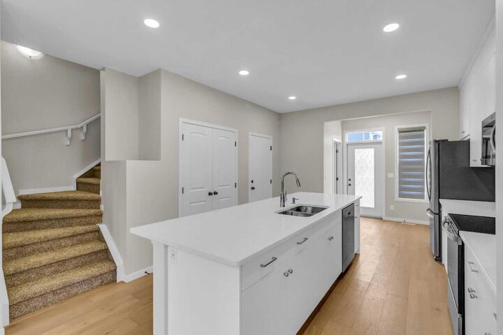 Property Photo: 249 Aquila Drive NW AB T3R 1Y6