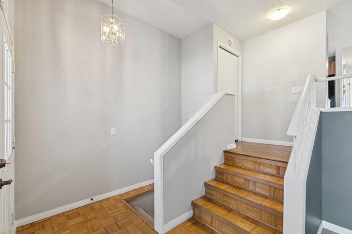 Property Photo: 3624 Cedarille Drive SW AB T2W 3X8