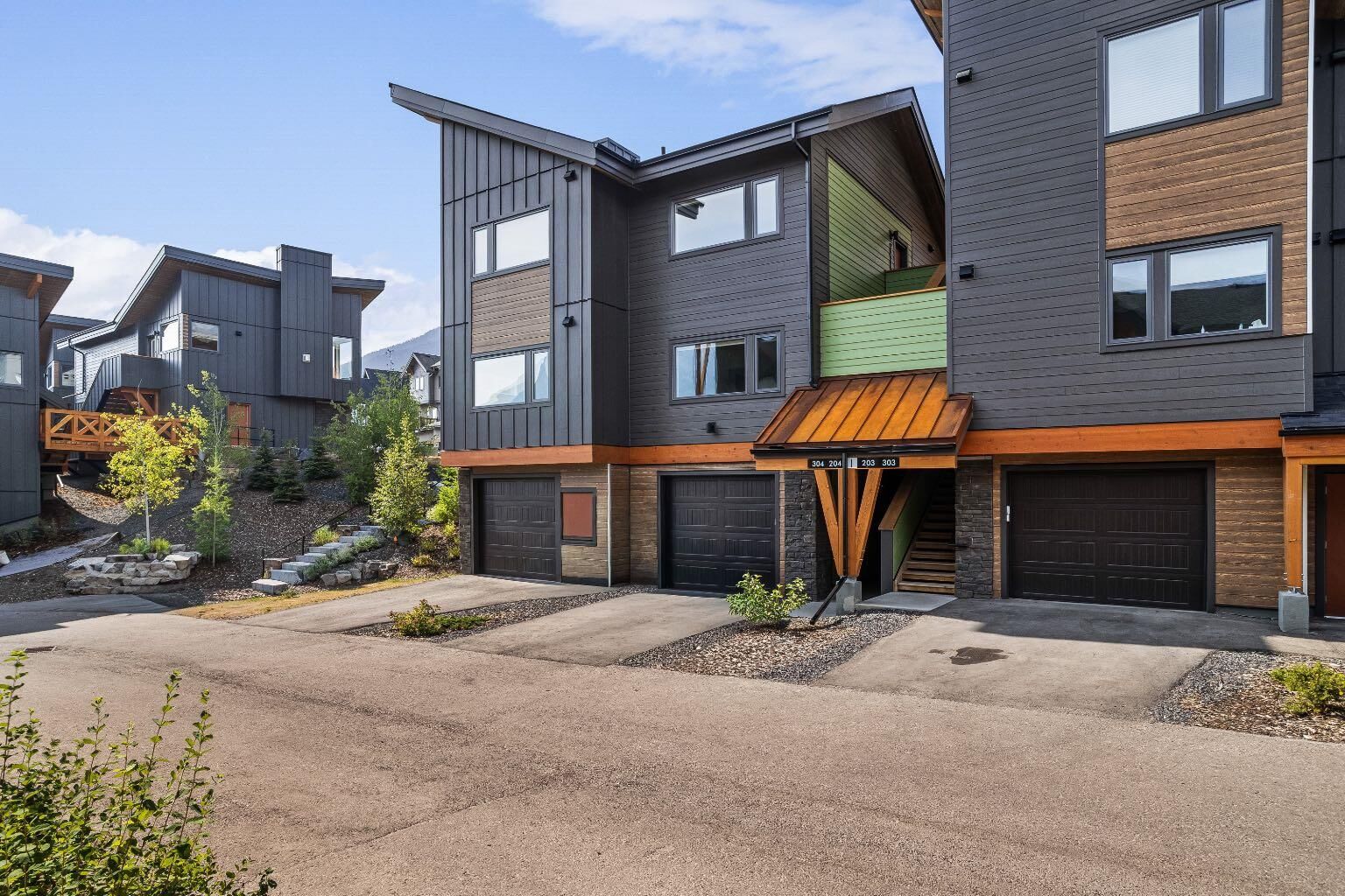 Property Photo: 209 Stewart Creek Rise 204I AB T1W 0N9