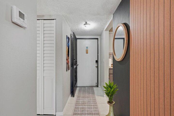 Property Photo:  4640 Lucerne Lakes Boulevard W 404  FL 33467 