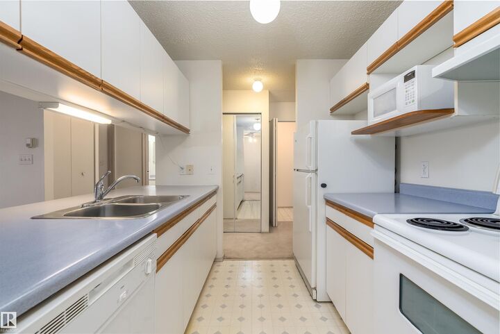 Property Photo: 4220 139 Avenue NW 306 AB T5Y 2Y2