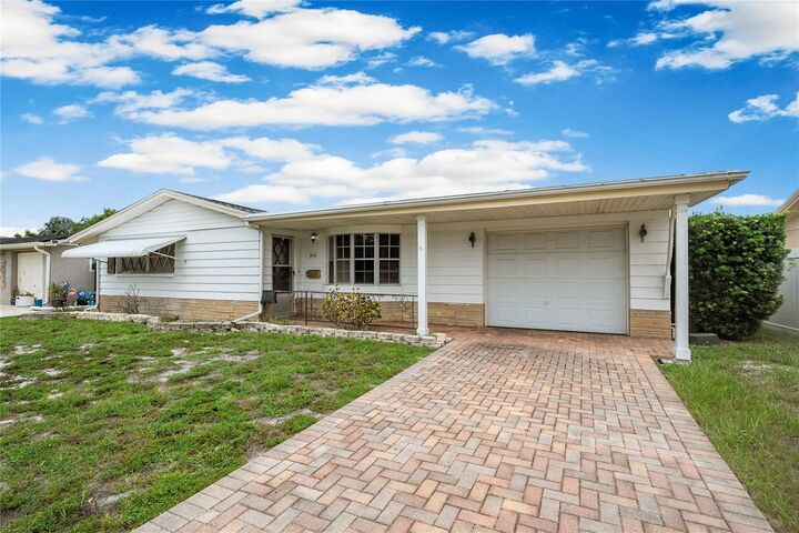 Property Photo:  3410 Columbus Drive  FL 34691 