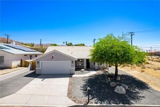 Property Photo:  12920 Maui Way  CA 92240 