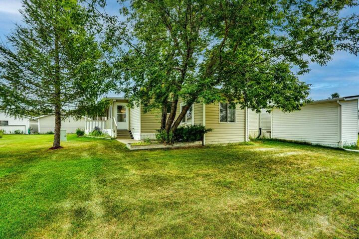 Property Photo: 132 Ranchwood Lane AB T1P 1M6