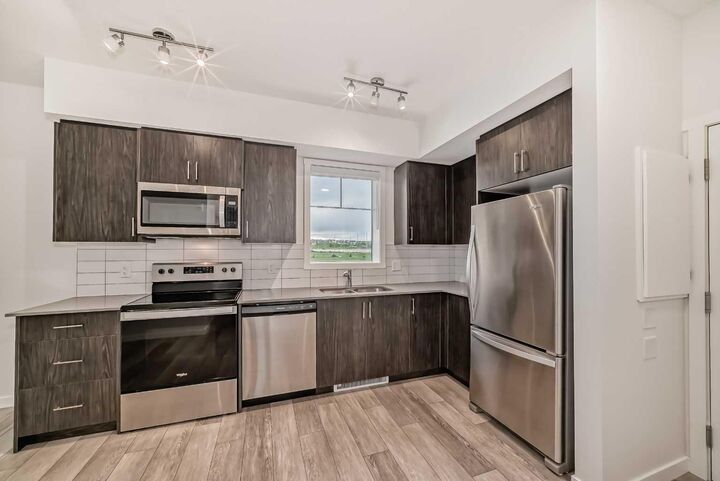 Property Photo:  3727 Sage Hill Drive NW 3204  AB T3R 1T7 