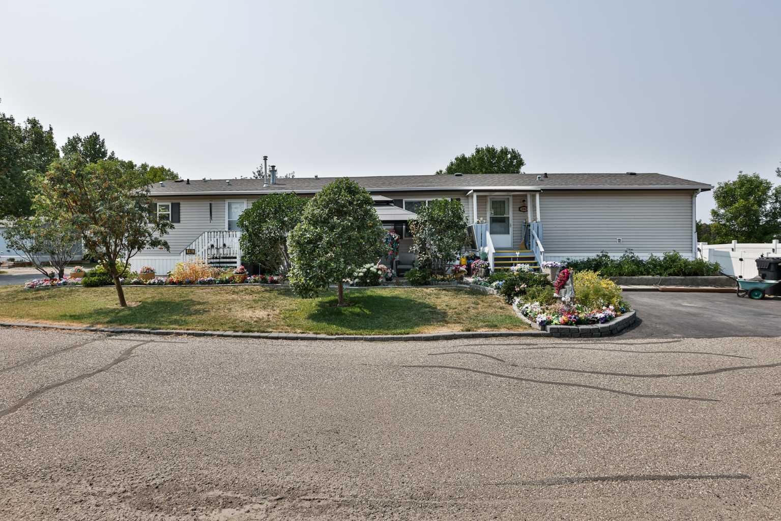 Property Photo: 402 Station Street AB T1M 1P5