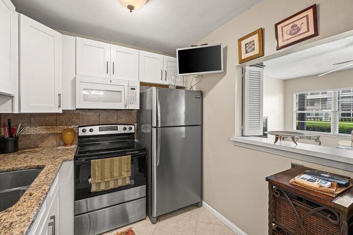 Property Photo:  175 Suffolk E 175  FL 33434 